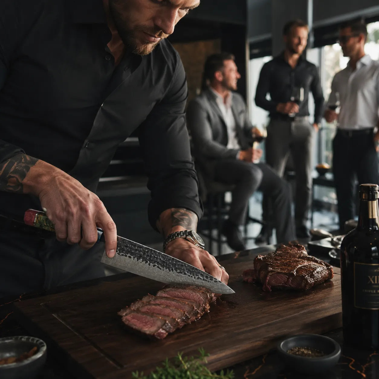 A man in a black shirt slices a cooked steak on a wooden cutting board in a dimly lit restaurant or bar setting, with other people blurred in the background.
